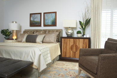 Inspiration for a large contemporary master dark wood floor bedroom remodel in Atlanta with white walls