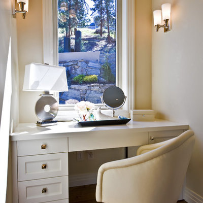 Bedroom - contemporary dark wood floor bedroom idea in Vancouver with beige walls