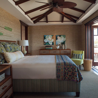 Inspiration for a mid-sized tropical bedroom remodel in Hawaii with brown walls
