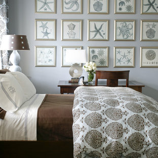 Inspiration for a coastal bedroom remodel in Little Rock with blue walls