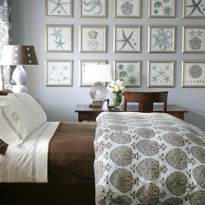 Inspiration for a coastal bedroom remodel in Little Rock with blue walls
