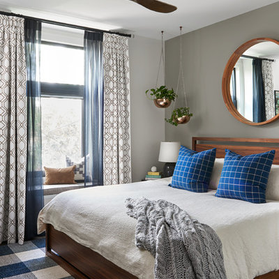 Example of a mid-sized transitional master dark wood floor and brown floor bedroom design in Toronto with beige walls