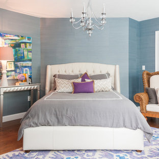 Elegant dark wood floor bedroom photo in Boston with blue walls