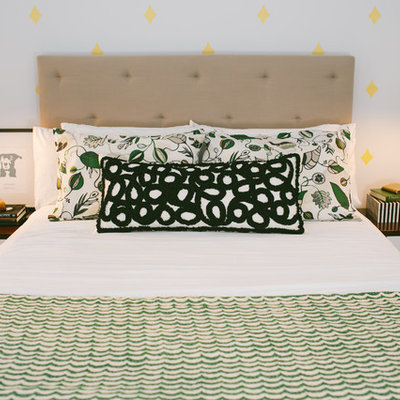 Example of a trendy bedroom design in DC Metro with multicolored walls