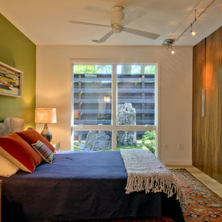 Mid-sized 1960s master light wood floor and beige floor bedroom photo in Indianapolis with white walls and no fireplace