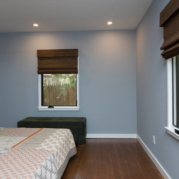 Midcentury Bedroom with Orange Accents