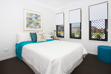 Example of a trendy bedroom design in Gold Coast - Tweed