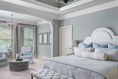 Example of a large tuscan master carpeted and gray floor bedroom design in Atlanta with gray walls