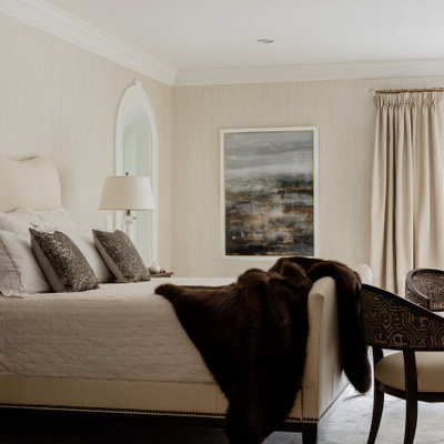 Bedroom - huge transitional master dark wood floor and brown floor bedroom idea in Boston with beige walls, a standard fireplace and a stone fireplace