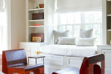 Large elegant guest dark wood floor bedroom photo in New York with beige walls