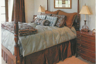 Example of a mid-sized classic master carpeted and brown floor bedroom design in Nashville with blue walls and no fireplace