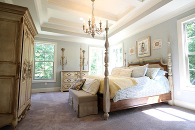 Large french country master carpeted and brown floor bedroom photo in Other with blue walls and no fireplace