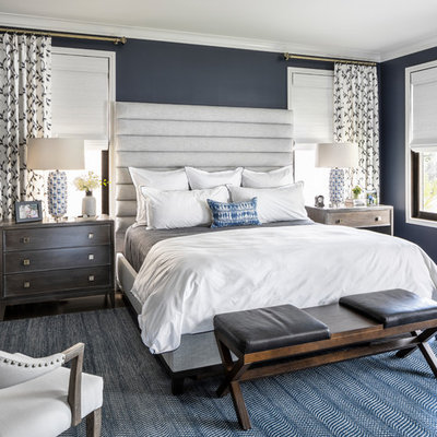 Transitional bedroom photo in New York with blue walls