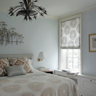 Bedroom - modern bedroom idea in New York with blue walls