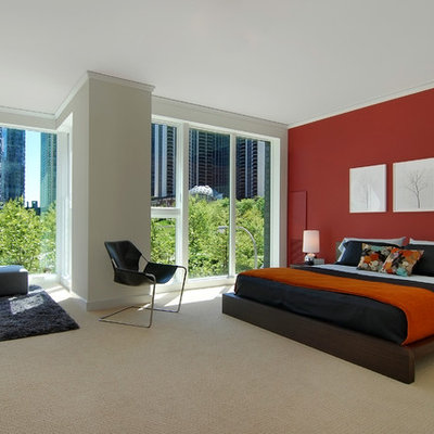 Inspiration for a modern carpeted bedroom remodel in Chicago with red walls