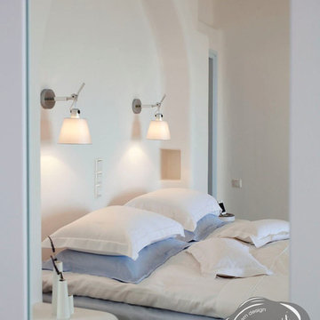 Modern Bedroom Design with Artemide Tolomeo Wall Lamps