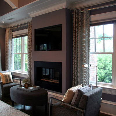 Bedroom - large transitional master dark wood floor bedroom idea in New York with purple walls, a metal fireplace and a standard fireplace