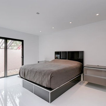 Modern complete renovation with custom wall panel and bedroom sets