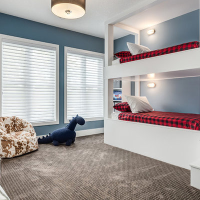 Inspiration for a large farmhouse carpeted and brown floor bedroom remodel in Calgary with blue walls