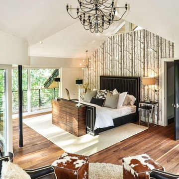 Modern Mountain Bedroom with TV Lift and black chandelier