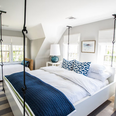 Beach style bedroom photo in Boston with gray walls