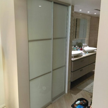 Modern-style apartments in Miami. Closet in master bathroom