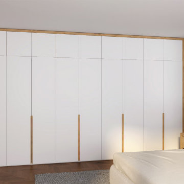 Modern style built in wardrobe with wooden handles