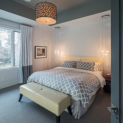 Mid-sized trendy master carpeted and gray floor bedroom photo in Toronto with white walls and no fireplace