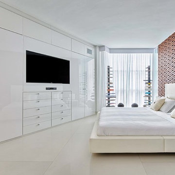 Modern white bedroom with custom cabinetwall and wooden headboard