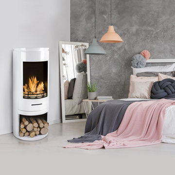 Modern White Cylinder Stove in a stylish bedroom setting