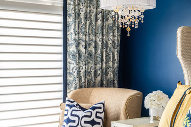 Elegant master bedroom photo with blue walls