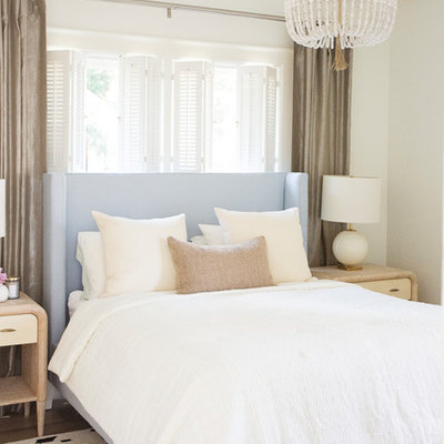 Mid-sized transitional master dark wood floor and brown floor bedroom photo in Atlanta with white walls and no fireplace