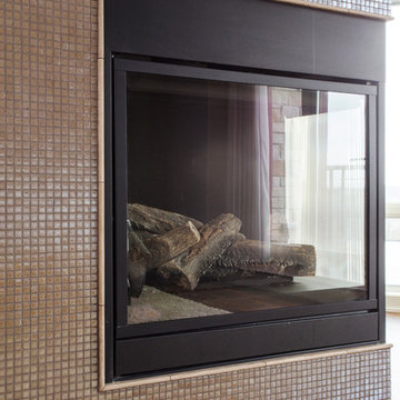 Mosaic Tile Corner Pre-Fabricated Fireplace in Master Suite