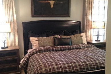 Example of an eclectic bedroom design in Charlotte