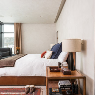 Photo of an expansive contemporary master bedroom in Other with beige walls and dark hardwood flooring.