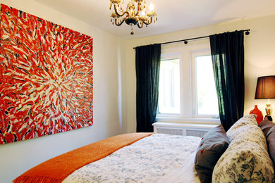 Bedroom - mid-sized transitional master medium tone wood floor bedroom idea in Toronto with white walls