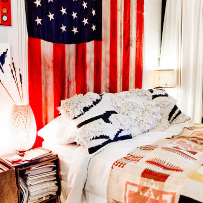 Bedroom - eclectic bedroom idea in New York with multicolored walls
