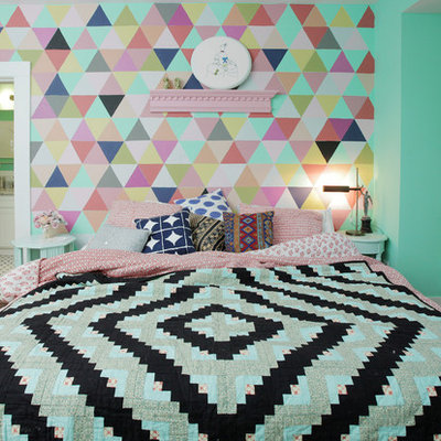 Inspiration for an eclectic dark wood floor bedroom remodel in Dallas with multicolored walls
