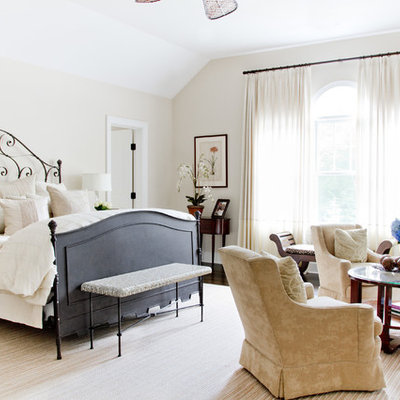 Bedroom - traditional master dark wood floor bedroom idea in New York with beige walls and no fireplace