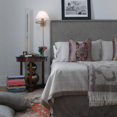 Inspiration for a contemporary master bedroom remodel in Montreal with white walls