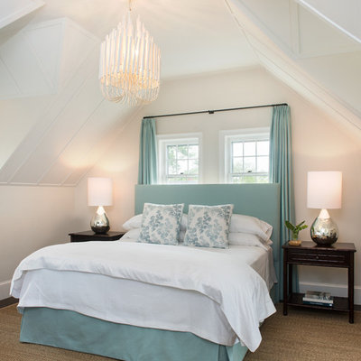 Example of a mid-sized beach style guest bedroom design in Boston with beige walls