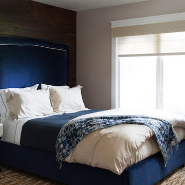 Navy velvet headboard guest bedroom