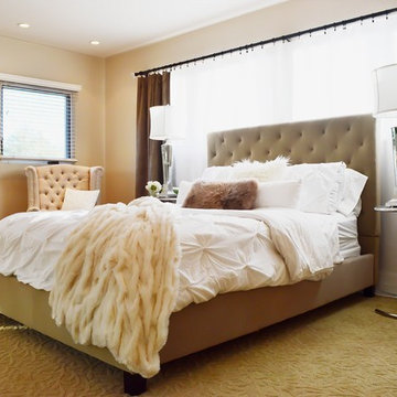 Neutral Bedroom With Tufted Bed, Chairs And Mirrored Furniture