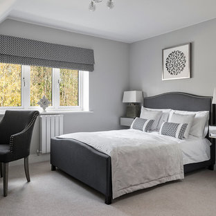 Photo of a classic guest bedroom in Berkshire with grey walls, beige floors and carpet.