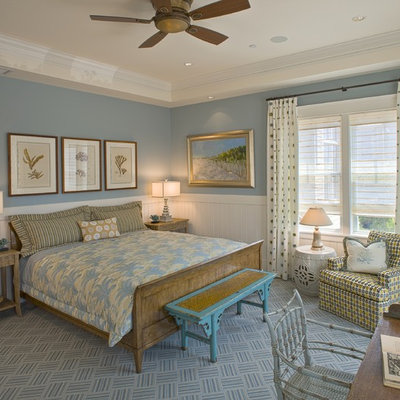 Mid-sized beach style medium tone wood floor and brown floor bedroom photo in Philadelphia with blue walls and no fireplace