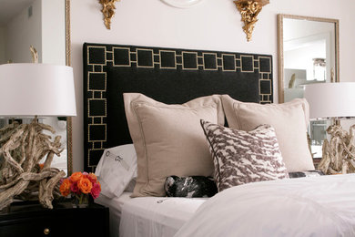 Transitional bedroom photo in New York with white walls