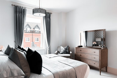 Photo of a contemporary bedroom in Buckinghamshire.