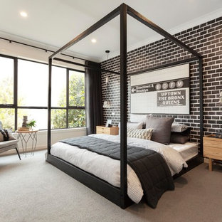Foto de dormitorio industrial con paredes negras, moqueta y suelo gris