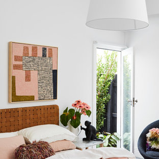 Design ideas for a contemporary bedroom in Melbourne with white walls.