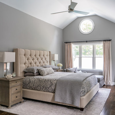 Bedroom - large traditional master dark wood floor and brown floor bedroom idea in Boston with gray walls and no fireplace